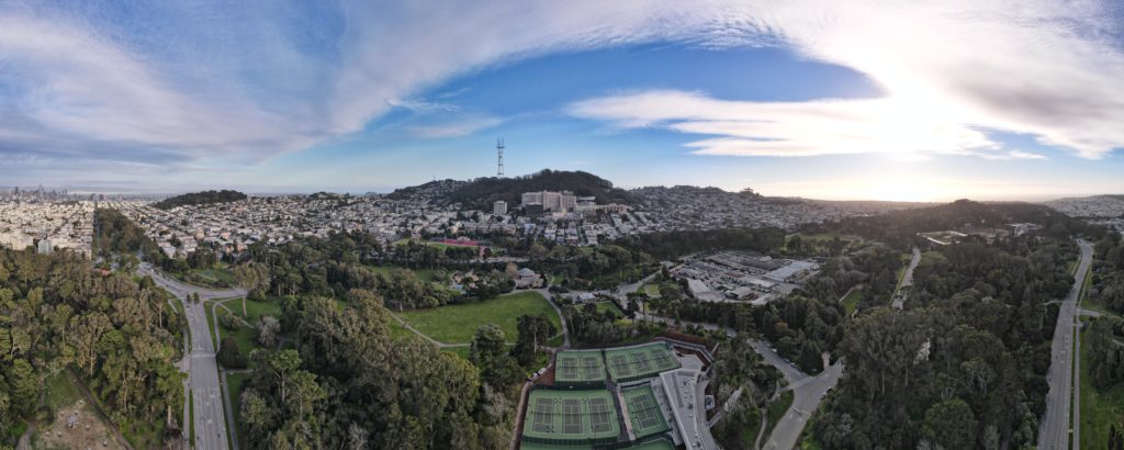Aerial view of 16 tennis courts and 5 pickleball courts at the Lisa & Douglas Goldman Tennis Center at Golden Gate Park in San Francisco. The entire tennis center was fully renovated in 2020 and 2021. The courts were surfaced using Plexipave acrylic in Florida Green and light Green.